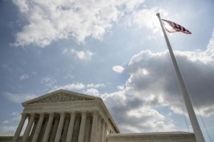 The U.S. flag flies in front of the Supreme Court in Washington.